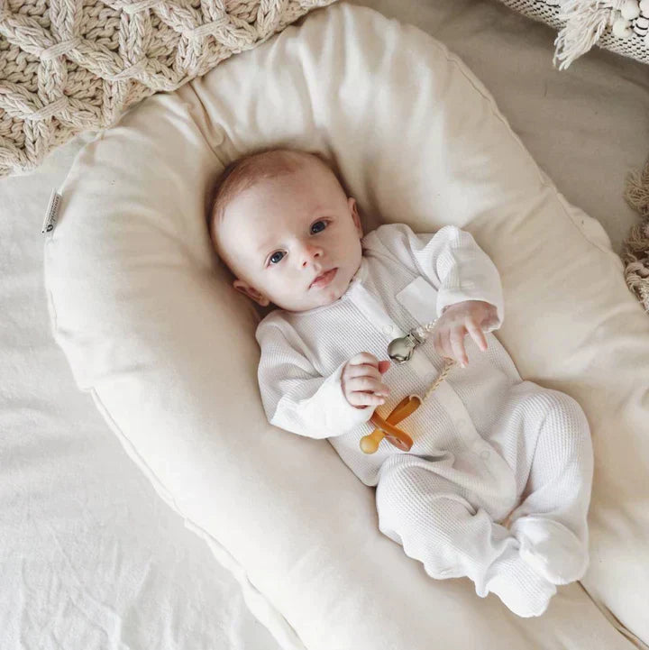 Cushioned Nest Sleep Pillow – Cozy & Portable Baby Lounger