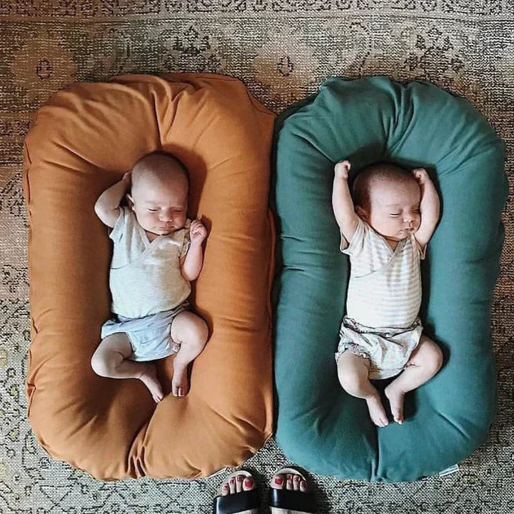 Cushioned Nest Sleep Pillow – Cozy & Portable Baby Lounger