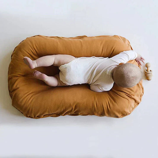 Cushioned Nest Sleep Pillow – Cozy & Portable Baby Lounger