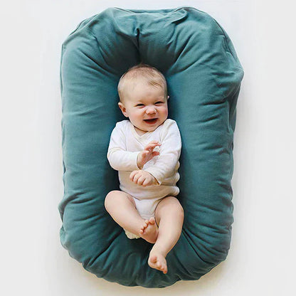 Cushioned Nest Sleep Pillow – Cozy & Portable Baby Lounger