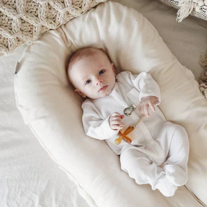 Cushioned Nest Sleep Pillow – Cozy & Portable Baby Lounger